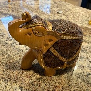 Beautiful wooden elephant figure from India. 5” tall. 7” from trunk to tail.